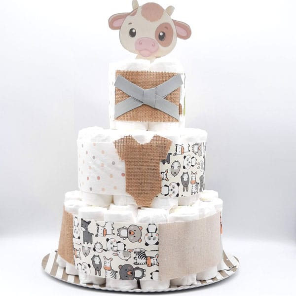 Tarta de pañales de tres pisos Vaquita con figura de vaca, arpillera y telas en tonos tierra