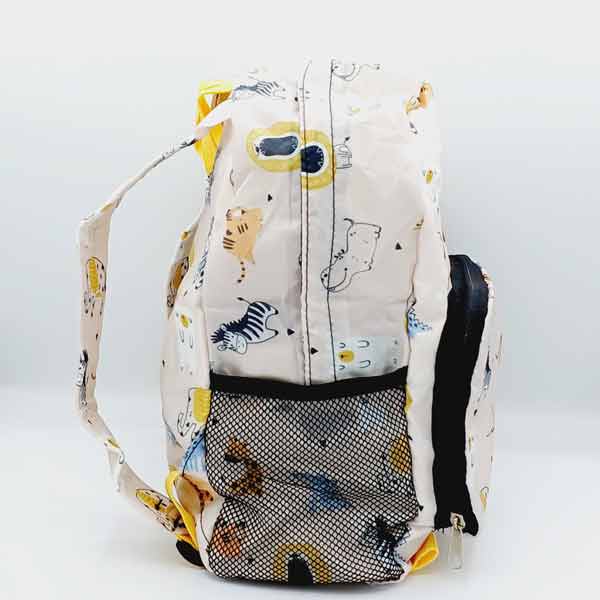 Mochila infantil plegable Gamberritos, vista lateral con bolsillo de rejilla