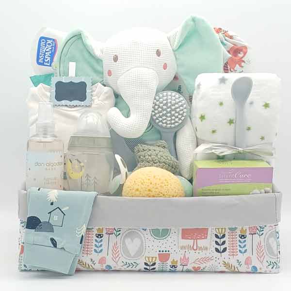Canastilla XL para bebé con elefante de peluche verde agua, biberón, toalla, esponja y ropa en caja con estampado floral