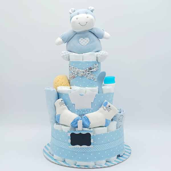 Tarta de pañales azul de tres pisos con hipopótamo de peluche, body, babero y productos de aseo para bebé niño